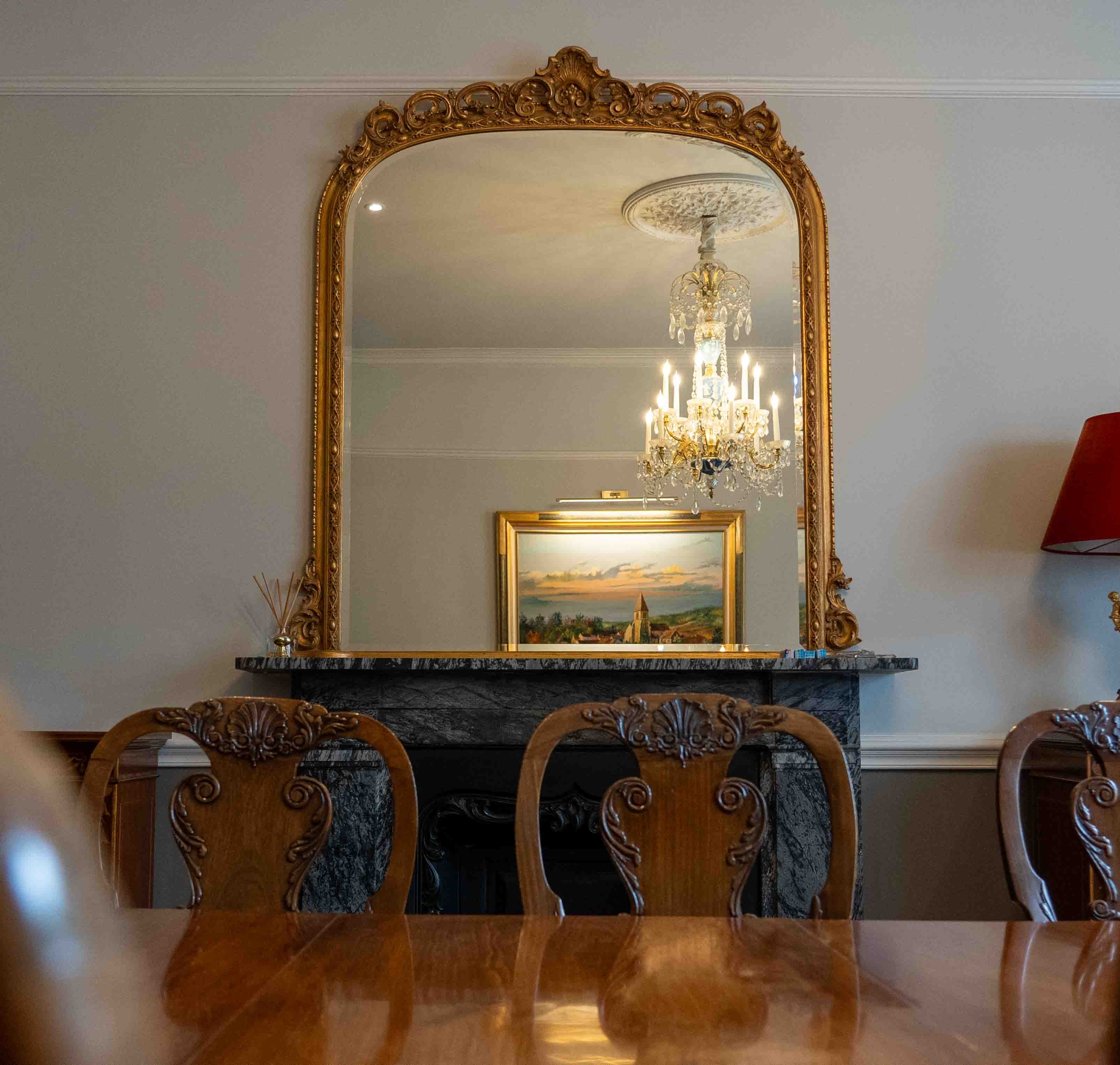 A Victorian style giltwood and composition overmantel mirror, width 140cm, height 164cm. Condition - good
